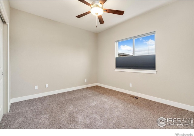 1512 Snowy Range Ct, Loveland, CO 80538 - unfurnished room with carpet floors, baseboards, and ceiling fan