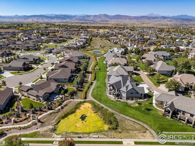 2001 Coralbells Ct, Longmont, CO 80503 - aerial view of property's location featuring nearby suburban area and a mountainous background