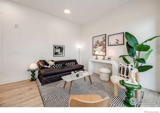 2876 W 53rd Ave Unit 301, Denver, CO 80221 - living area with wood finished floors, baseboards, and recessed lighting