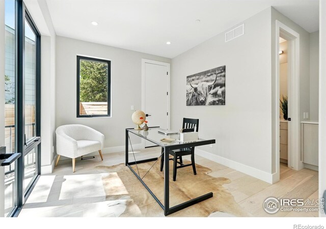 2860 Table Mesa Dr, Boulder, CO 80305 - home office featuring light wood finished floors, baseboards, and recessed lighting