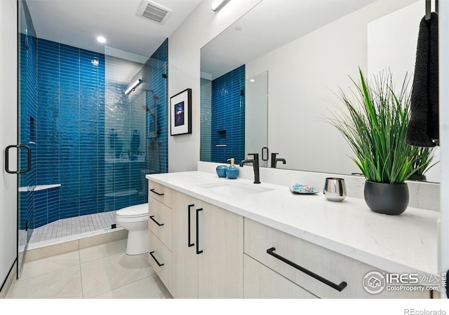 2860 Table Mesa Dr, Boulder, CO 80305 - full bathroom featuring toilet, vanity, a stall shower, recessed lighting, and tile patterned floors