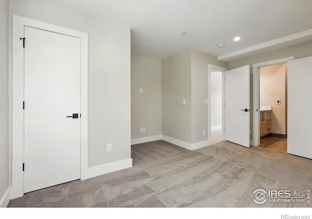 2860 Table Mesa Dr, Boulder, CO 80305 - unfurnished bedroom featuring carpet flooring, recessed lighting, baseboards, and ensuite bath