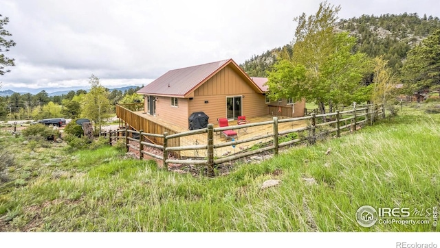 17284 W County Road 74e, Red Feather Lakes, CO 80545 - view of side of home featuring metal roof
