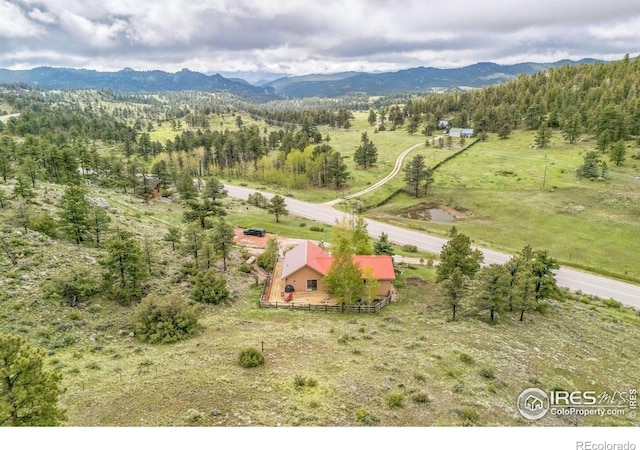 17284 W County Road 74e, Red Feather Lakes, CO 80545 - overview of rural landscape with mountains