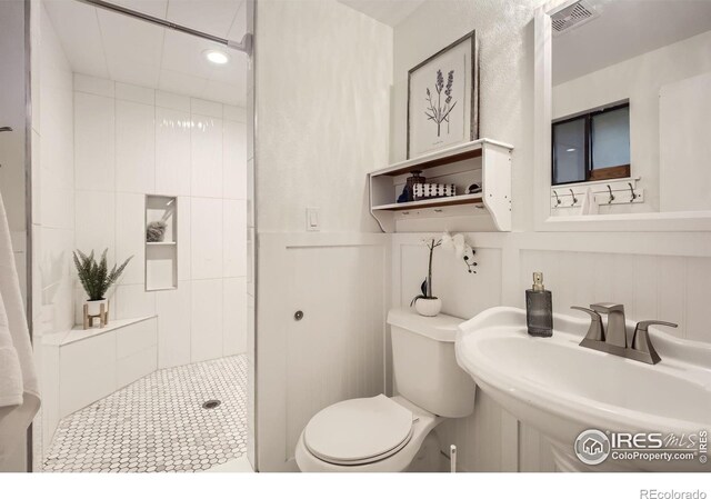 1510 22nd Ave, Longmont, CO 80501 - full bathroom with toilet, a stall shower, a sink, and recessed lighting