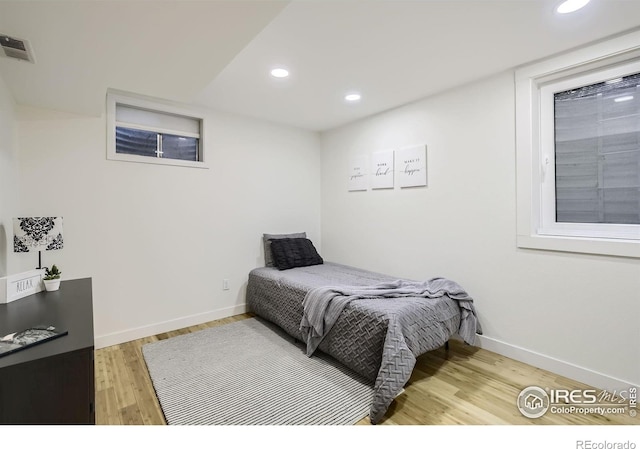1510 22nd Ave, Longmont, CO 80501 - bedroom featuring light wood-type flooring, recessed lighting, and baseboards