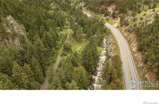 35106 Boulder Canyon Dr, Boulder, CO 80302 - drone / aerial view of a heavily wooded area