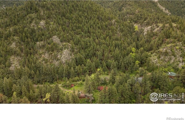35106 Boulder Canyon Dr, Boulder, CO 80302 - aerial view of a heavily wooded area