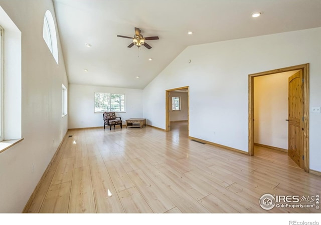 24192 W County Road 74e, Red Feather Lakes, CO 80545 - empty room with ceiling fan, high vaulted ceiling, light wood finished floors, recessed lighting, and baseboards