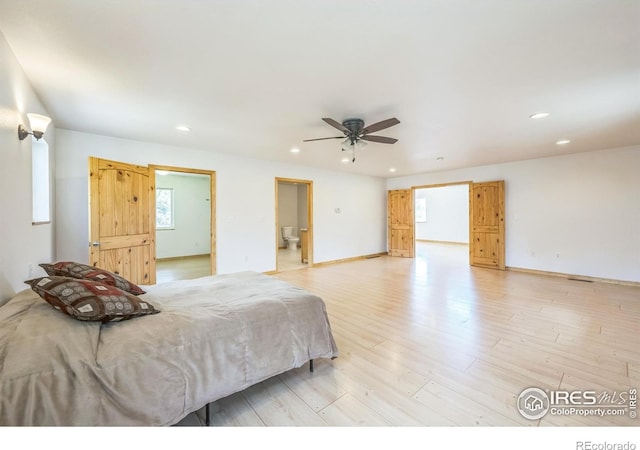 24192 W County Road 74e, Red Feather Lakes, CO 80545 - bedroom with recessed lighting, light wood-type flooring, and baseboards