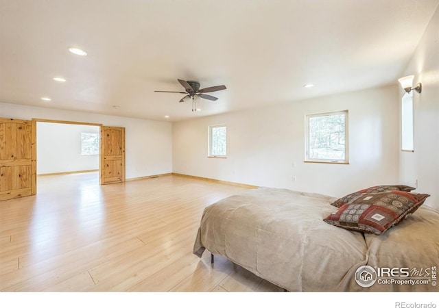 24192 W County Road 74e, Red Feather Lakes, CO 80545 - bedroom with recessed lighting, light wood-style flooring, and ceiling fan