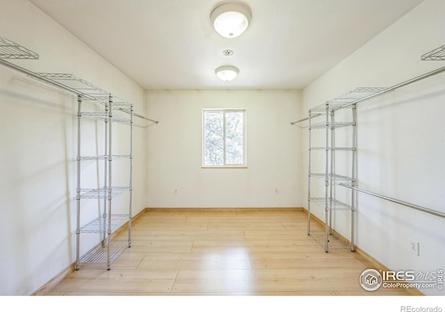 24192 W County Road 74e, Red Feather Lakes, CO 80545 - spacious closet with wood finished floors