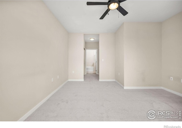 13598 Via Varra Unit 404, Broomfield, CO 80020 - spare room with carpet floors, ceiling fan, and baseboards