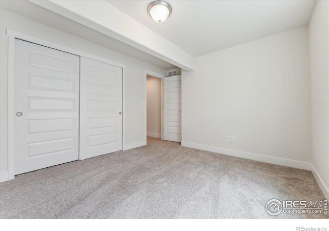 1257 Wild Basin Rd, Severance, CO 80550 - unfurnished bedroom featuring carpet, baseboards, and a closet