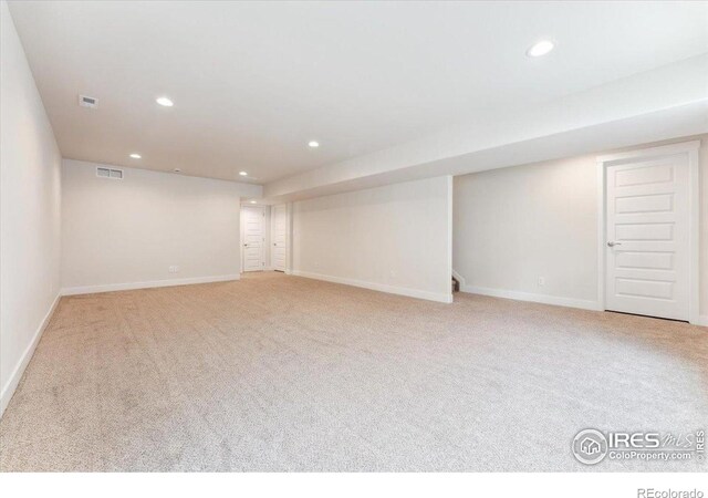 1257 Wild Basin Rd, Severance, CO 80550 - finished below grade area featuring carpet floors, recessed lighting, and baseboards