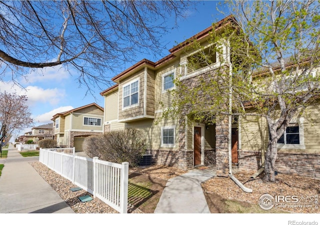 5014 Brookfield Dr Unit B, Fort Collins, CO 80528 - multi unit property with stone siding and cooling unit