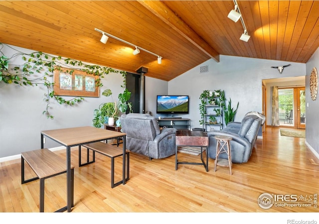 50 S 31st St, Boulder, CO 80305 - living area featuring track lighting, wood finished floors, wooden ceiling, and baseboards