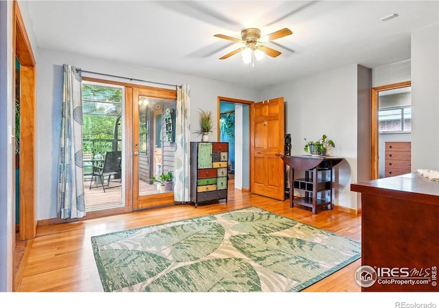 50 S 31st St, Boulder, CO 80305 - entrance foyer with plenty of natural light, ceiling fan, wood finished floors, and baseboards
