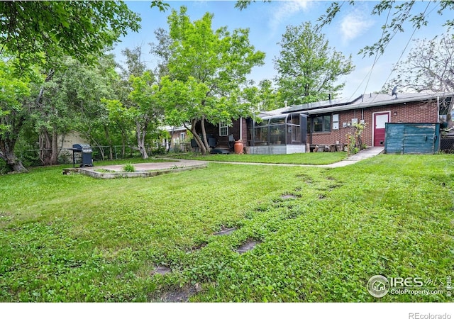 50 S 31st St, Boulder, CO 80305 - view of grassy yard with a sunroom