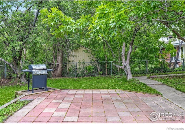 50 S 31st St, Boulder, CO 80305 - fenced backyard featuring grilling area and a patio