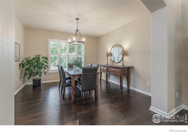 2204 Lasalle St, Superior, CO 80027 - dining space with a chandelier, hardwood / wood-style flooring, arched walkways, and baseboards