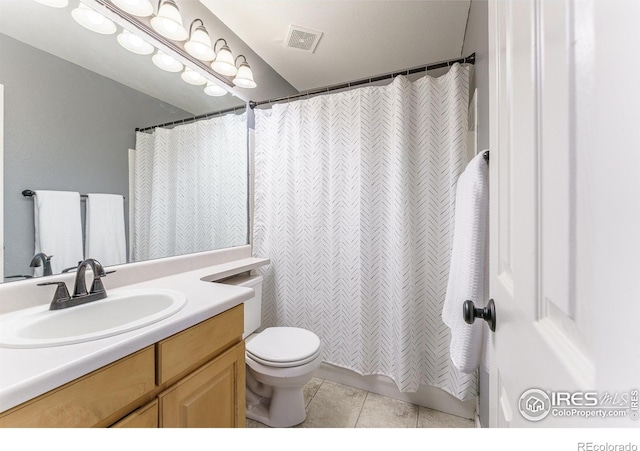 2204 Lasalle St, Superior, CO 80027 - bathroom featuring vanity, tile patterned floors, toilet, and a shower with shower curtain