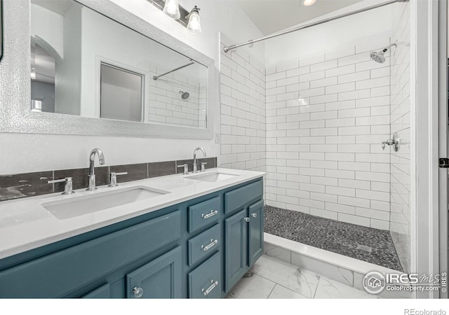 13024 Grant Cir W Unit A, Thornton, CO 80241 - bathroom featuring marble finish flooring, a tile shower, double vanity, and recessed lighting