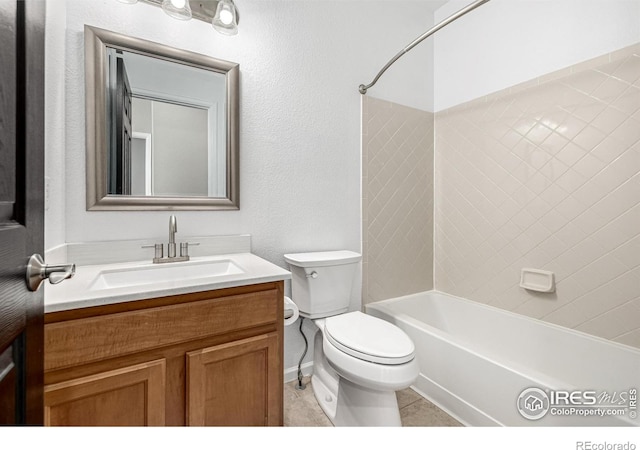 13024 Grant Cir W Unit A, Thornton, CO 80241 - bathroom featuring toilet, vanity, bathtub / shower combination, tile patterned floors, and a textured wall