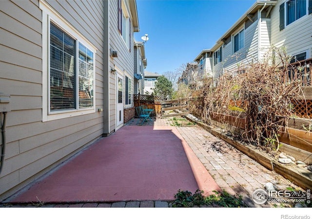 13024 Grant Cir W Unit A, Thornton, CO 80241 - fenced backyard featuring a patio area