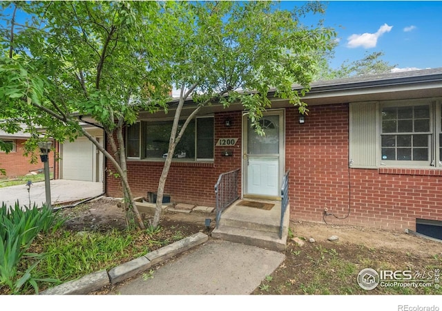1200 Emigh St, Fort Collins, CO 80524 - view of front facade featuring brick siding