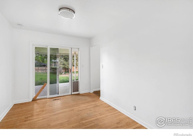 1200 Emigh St, Fort Collins, CO 80524 - empty room featuring light wood-style flooring and baseboards