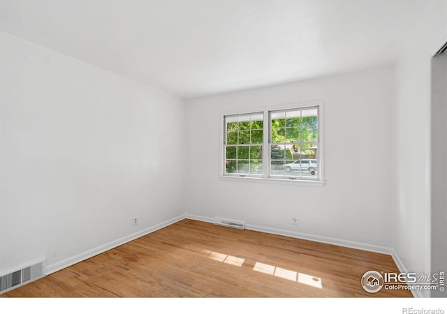 1200 Emigh St, Fort Collins, CO 80524 - empty room with light wood finished floors and baseboards
