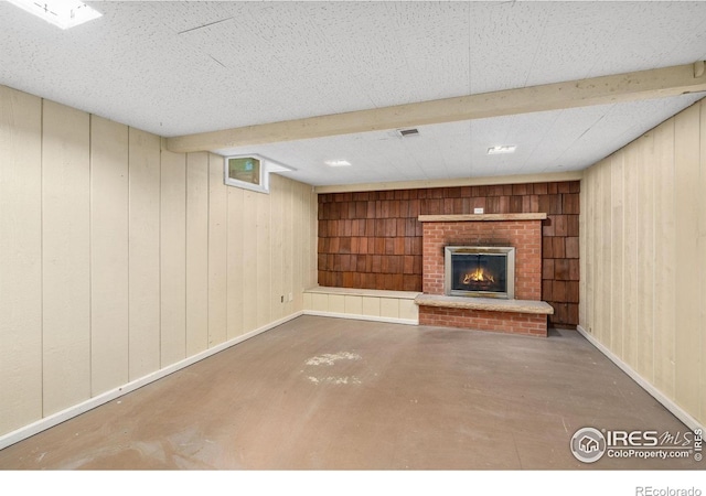 1200 Emigh St, Fort Collins, CO 80524 - unfurnished living room with wood walls, a fireplace, baseboards, and built in features