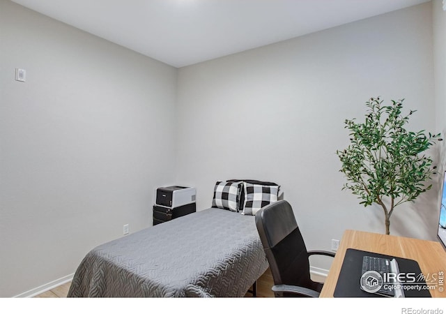 2086 Autumn Moon Dr Unit 7, Windsor, CO 80550 - bedroom with wood finished floors and baseboards