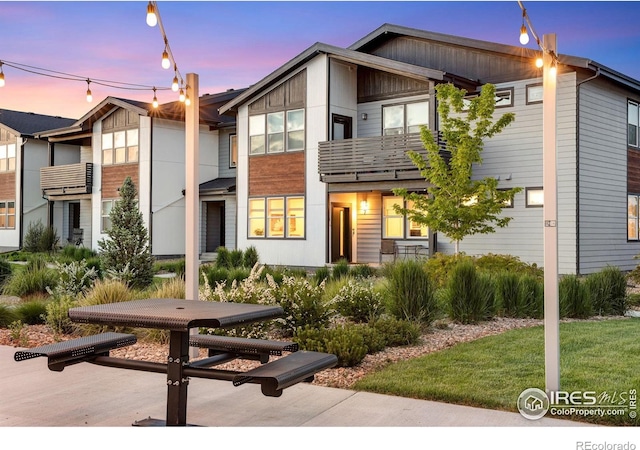 2086 Autumn Moon Dr Unit 7, Windsor, CO 80550 - view of front facade featuring a balcony