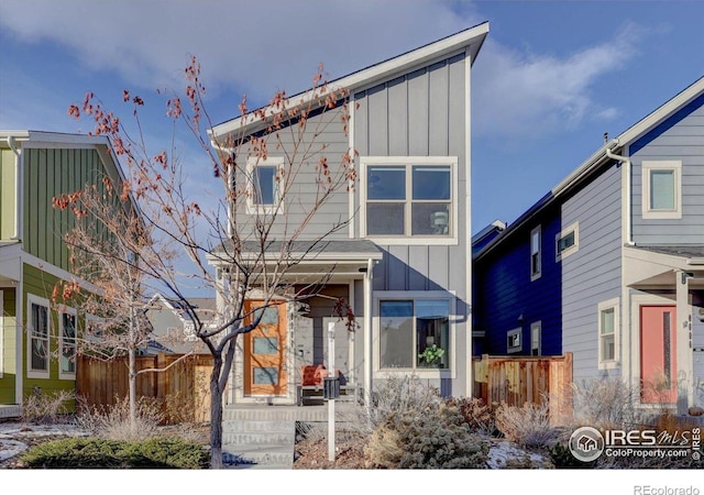 5863 Boston St, Denver, CO 80238 - view of front of house with board and batten siding