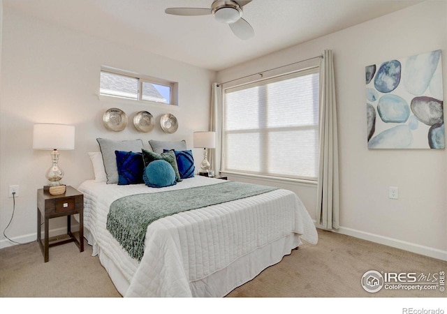 5863 Boston St, Denver, CO 80238 - bedroom featuring carpet flooring, baseboards, and a ceiling fan
