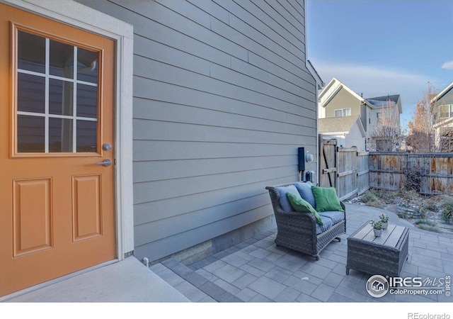 5863 Boston St, Denver, CO 80238 - fenced backyard with a patio area