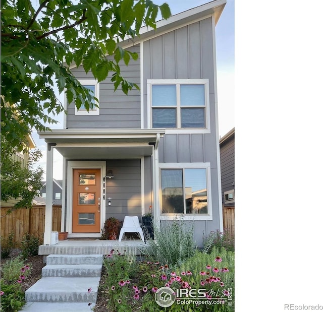 5863 Boston St, Denver, CO 80238 - contemporary house featuring board and batten siding and covered porch
