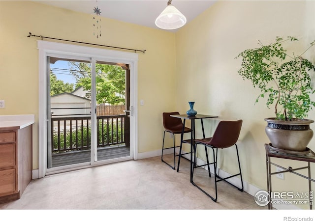 820 Kimbark St Unit D, Longmont, CO 80501 - dining area featuring baseboards