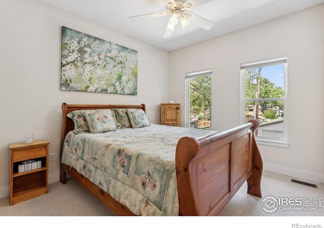820 Kimbark St Unit D, Longmont, CO 80501 - carpeted bedroom featuring baseboards and ceiling fan
