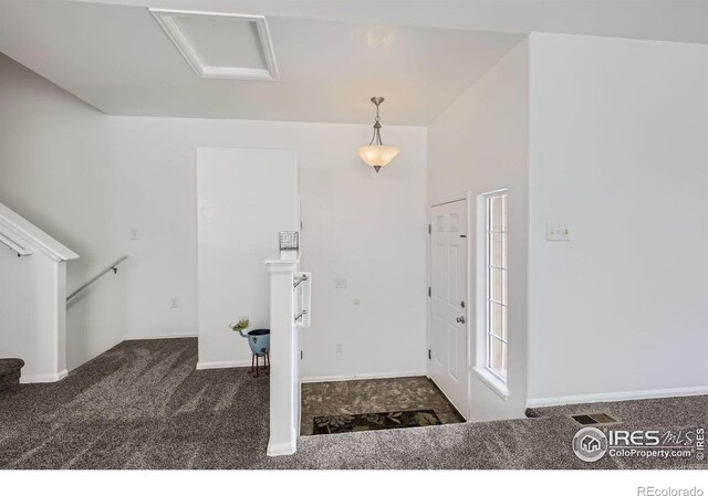 2220 Woodbury Ln, Fort Collins, CO 80524 - foyer entrance featuring carpet floors and baseboards