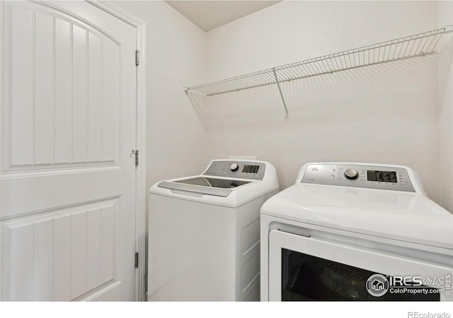 2767 Stallion Way, Mead, CO 80542 - laundry room featuring washer and clothes dryer