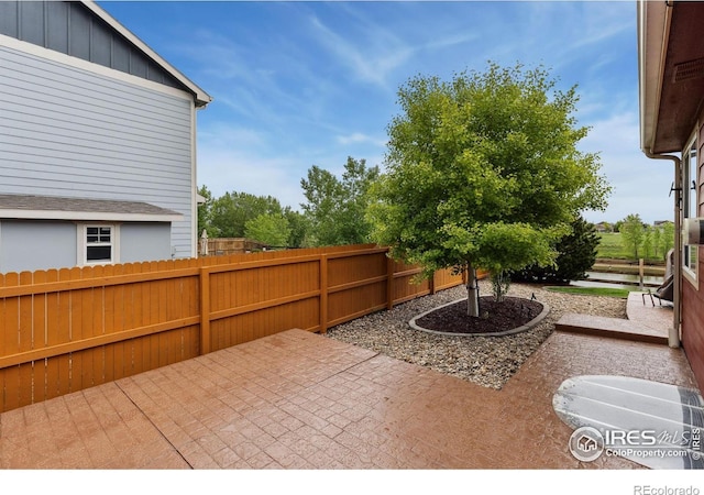 2767 Stallion Way, Mead, CO 80542 - fenced backyard with a patio