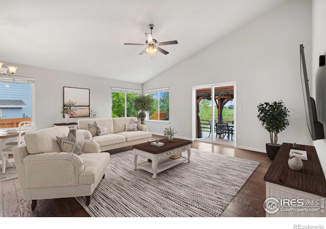 2767 Stallion Way, Mead, CO 80542 - living room featuring a ceiling fan, wood finished floors, baseboards, a chandelier, and high vaulted ceiling