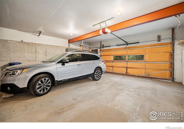 335 Wild Horse Cir, Boulder, CO 80304 - garage with a garage door opener