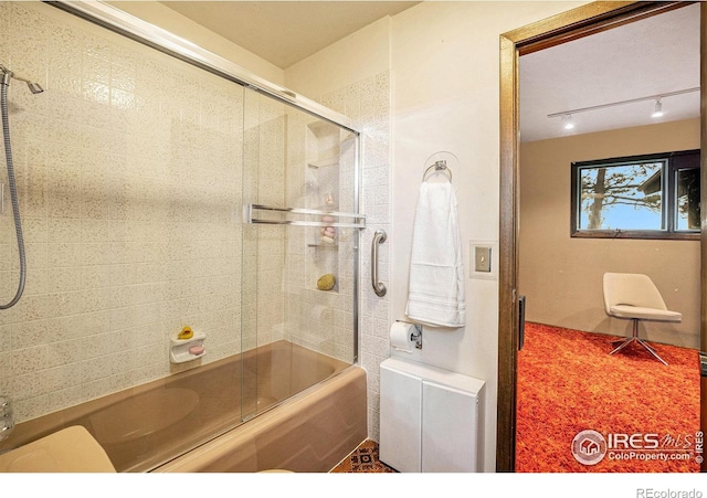 335 Wild Horse Cir, Boulder, CO 80304 - full bath with bath / shower combo with glass door and toilet