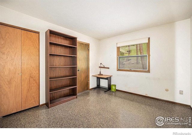 335 Wild Horse Cir, Boulder, CO 80304 - spare room with baseboards and speckled floor