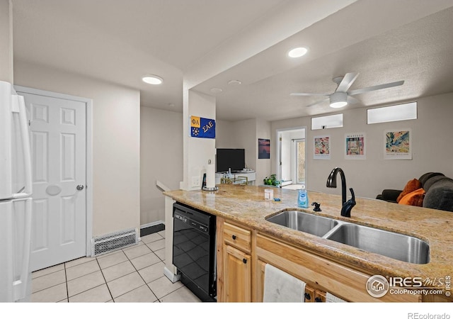 1065 University Ave Unit 121, Boulder, CO 80302 - kitchen with dishwasher, a sink, freestanding refrigerator, ceiling fan, and light tile patterned flooring