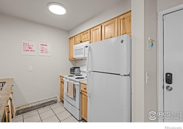 1065 University Ave Unit 121, Boulder, CO 80302 - kitchen featuring white appliances, light brown cabinetry, light countertops, and light tile patterned floors